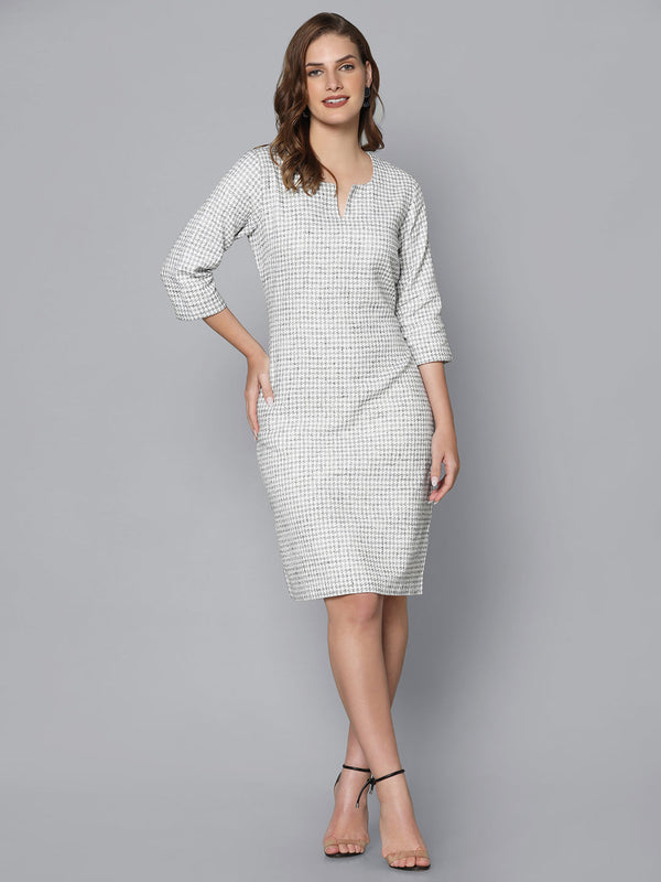 Houndstooth printed shift dress in white, elegant and stylish design.